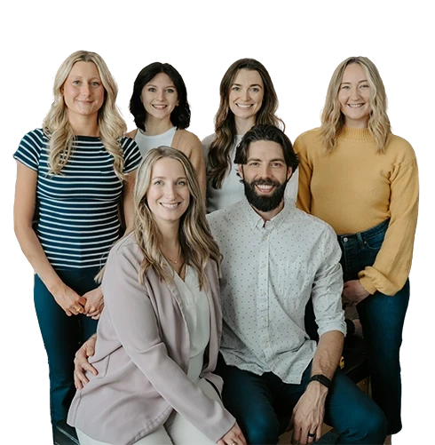 Chiropractor Zionsville IN Benjamin and Danielle Hennes With Team Cutout NEW 1