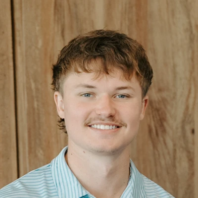 Chiropractor Zionsville IN Jacob Steckler Smiles Warmly Welcoming Potential Patients